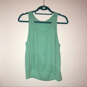 Light blue sheer top with cutouts